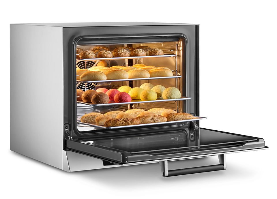 Smeg ALFA oven in a professional kitchen delivering consistent browning and crispness across multiple trays during a cooking cycle