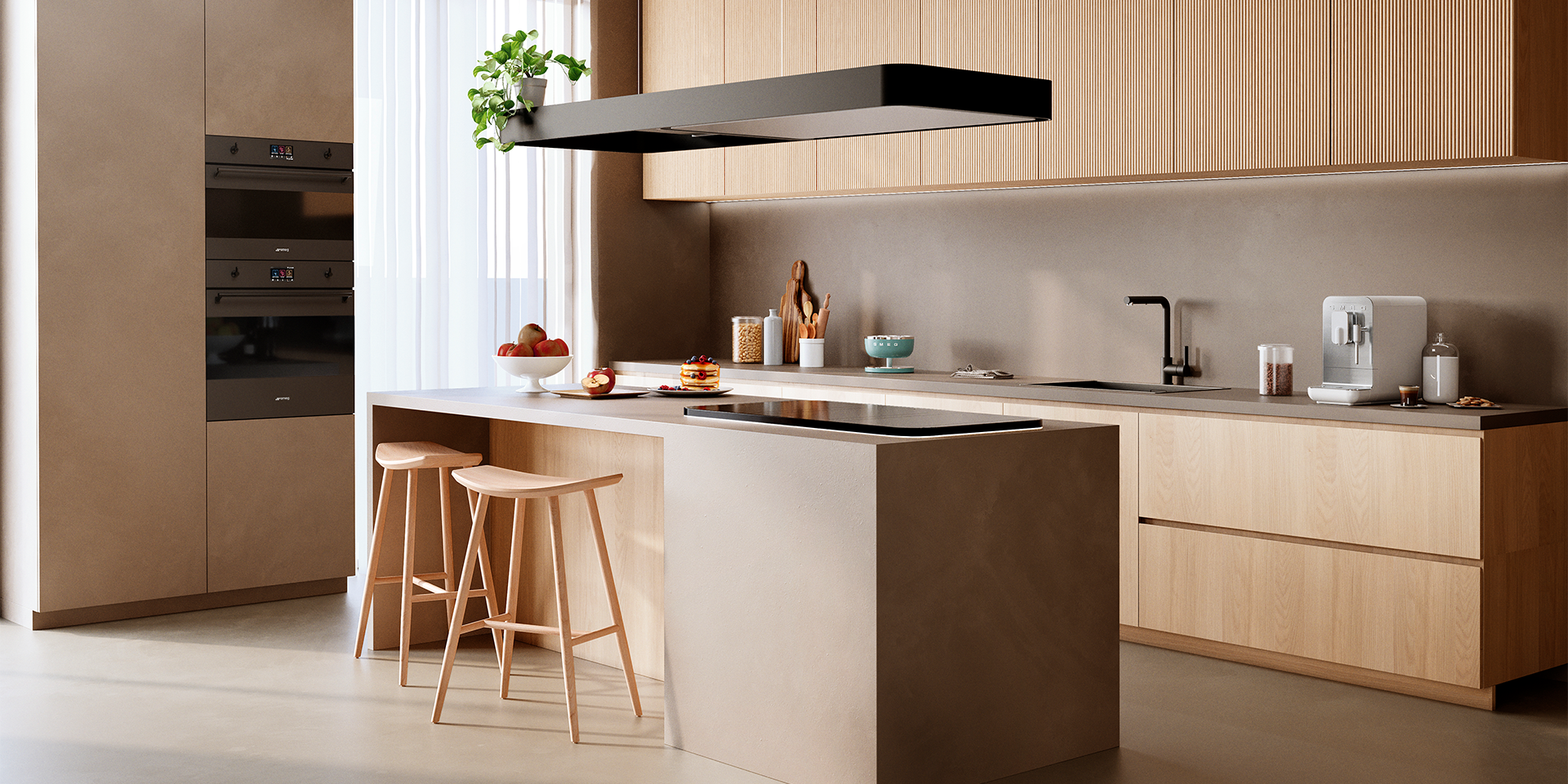 Warm toned kitchen featuring matte black Classic ovens and new ISOLA alta cooktop