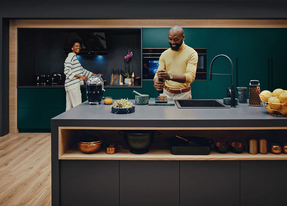 Dolce Still Novo Kitchen with a man and woman cooking
