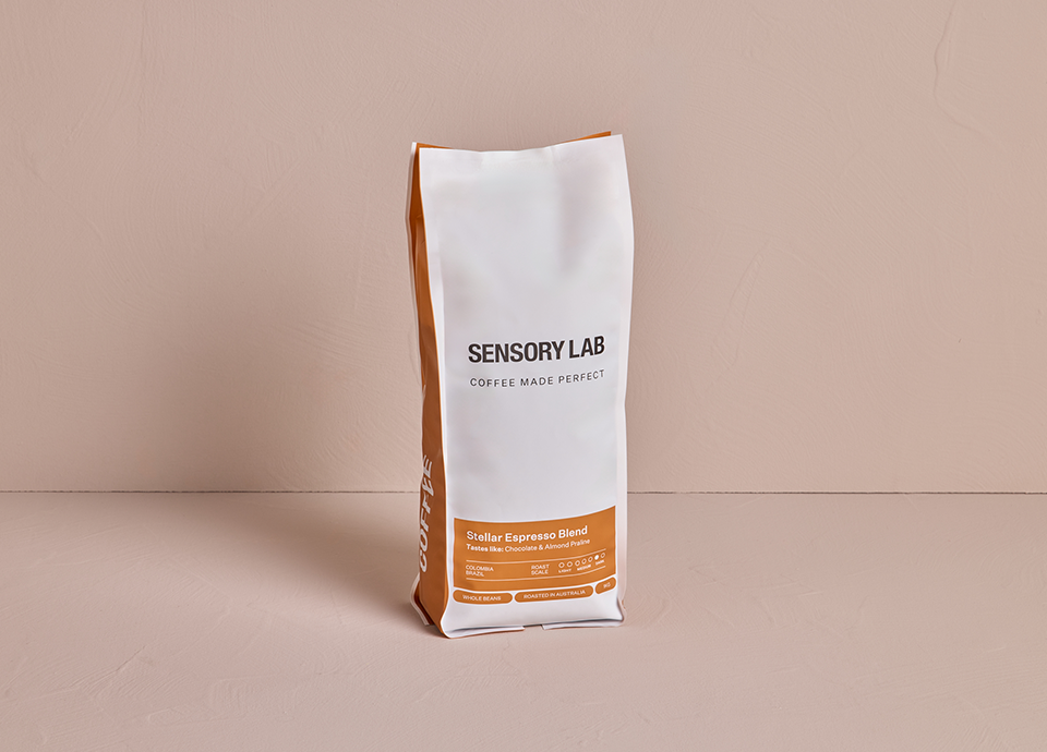 Sensory Lab beans against a pink background