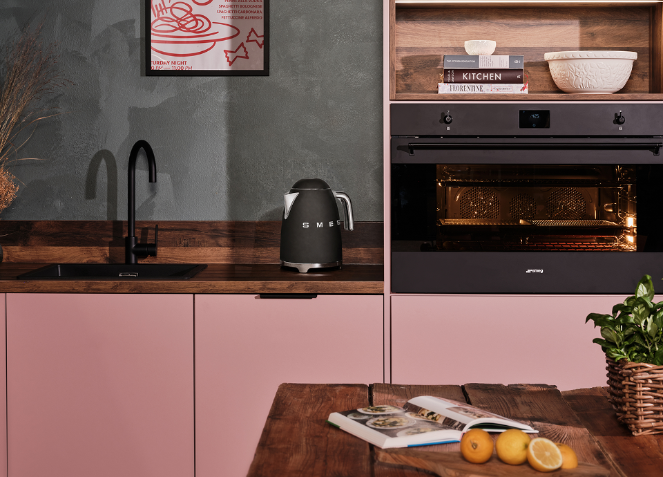 Matte Black kitchen in dark green moody cabinetry