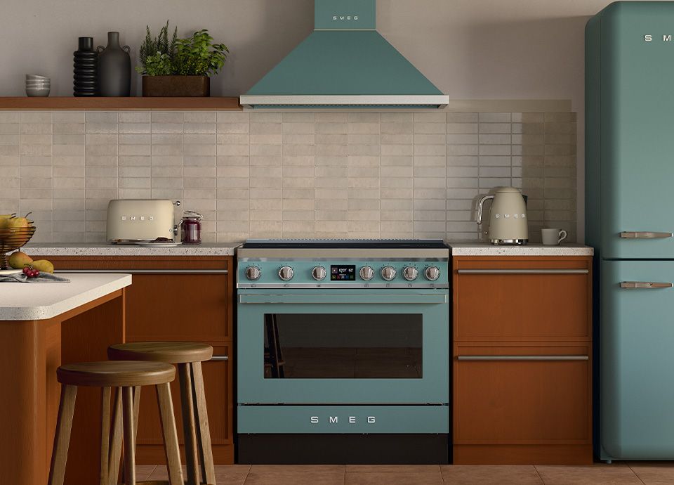 Earthy rust coloured cabinetry with emerald green appliances