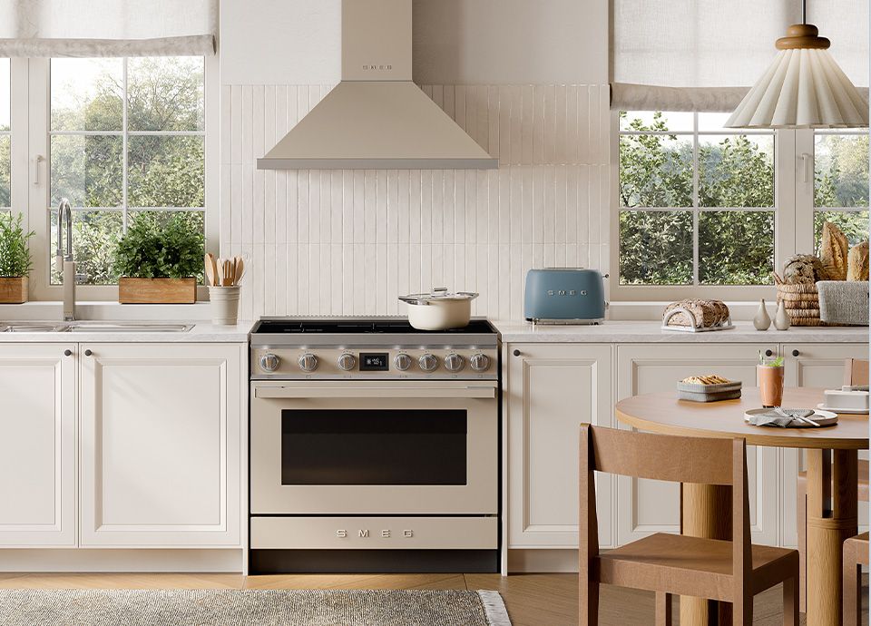 A neutral kitchen with moonlight portofino freestanding cooker and range hood