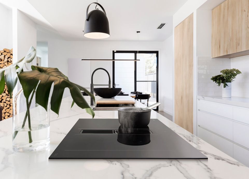 Un lot de 2 poêles offert pour tout achat d’une table de cuisson induction avec hotte intégrée| Smeg France