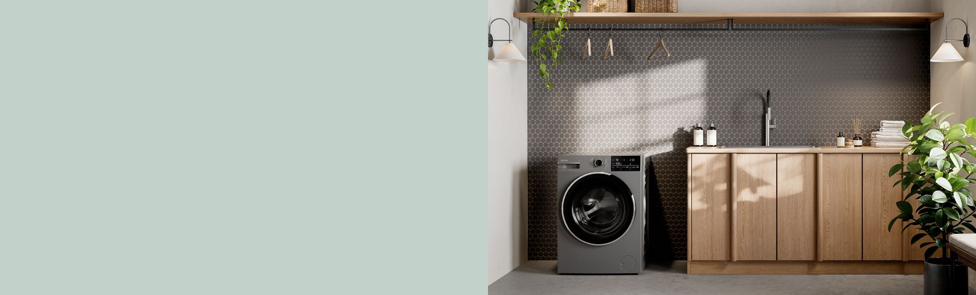Lavatrice Smeg colore grigio ambientata in lavanderia moderna e funzionale
