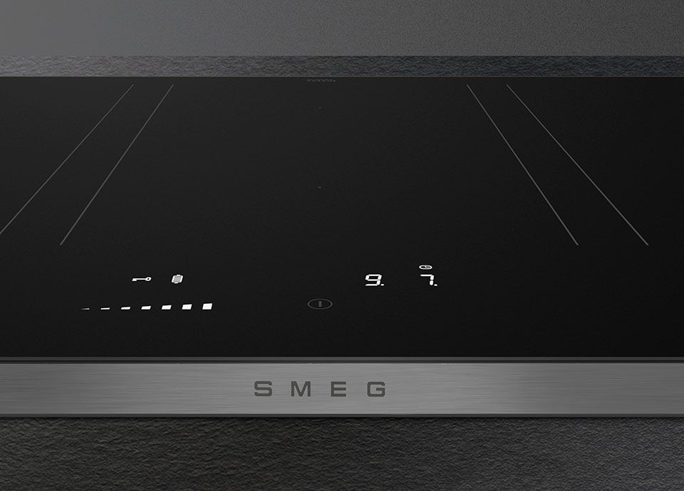 Detail of the Evo Slider backlit controls on SMEG Isola induction hob