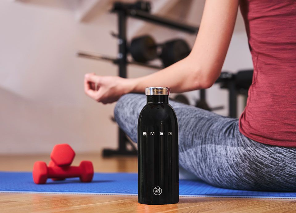 Black Smeg water bottle in the gym