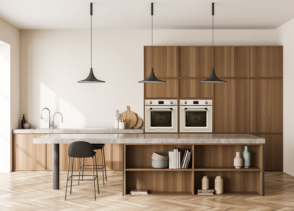A white, retro style kitchen featuring Smeg's 50's style single oven, integrated into white kitchen units.