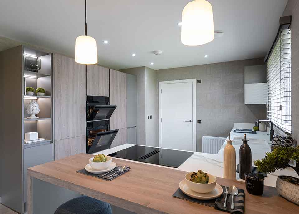 Modern new build kitchen with oven doors open