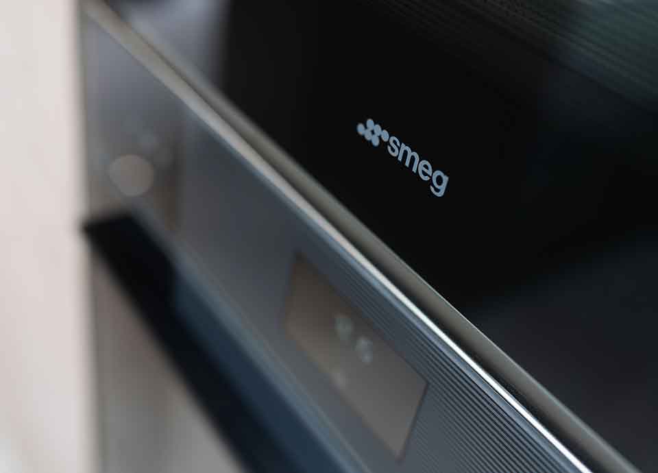 Close up of Smeg oven display and handle in black