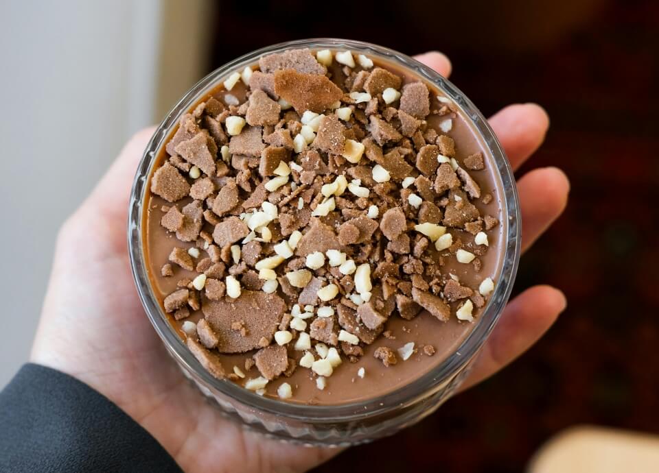 A generous serving of the smoked sea salt and caramel chocolate pots topped with hobnob crumbs and chocolate shavings.