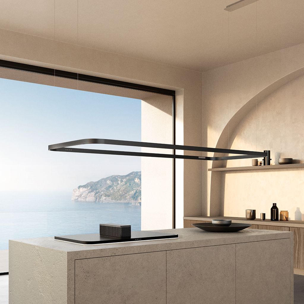Island extractor hood from the Isola collection installed over a hob