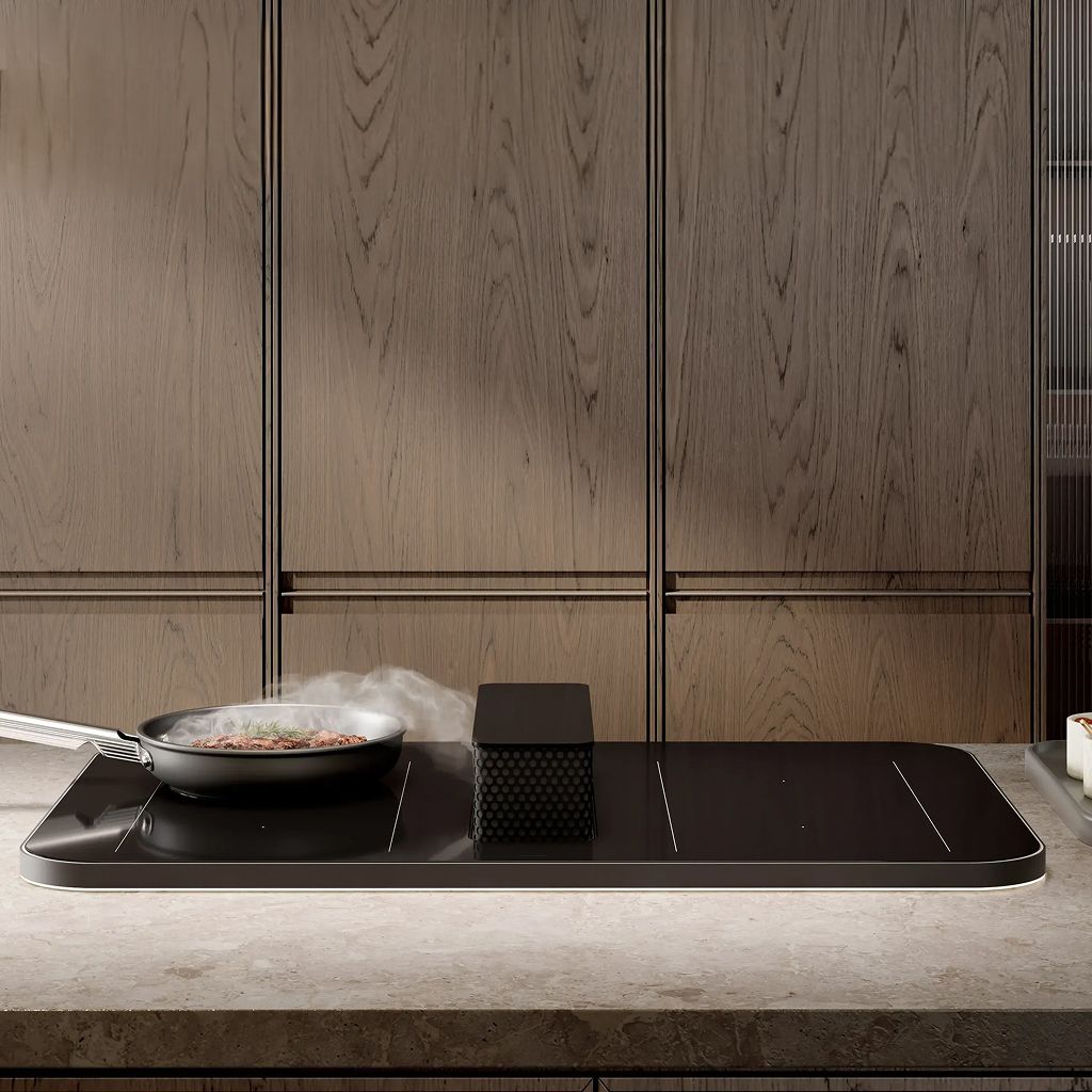 Modern kitchen interior featuring a minimalist black induction hoob with integrated into a counter, with matching textured wood wall panels.