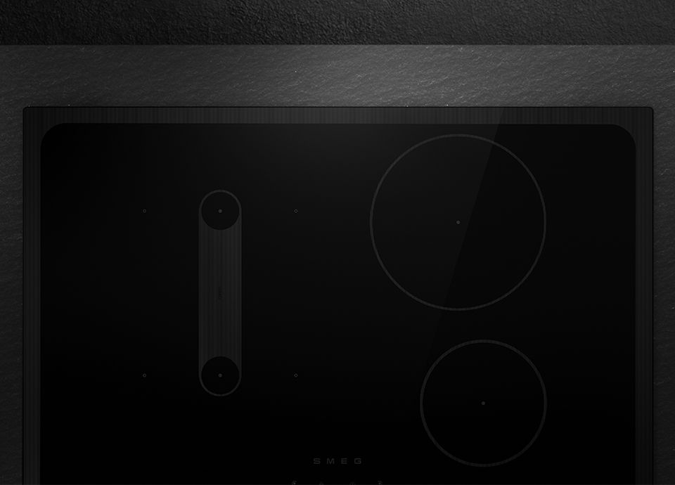 The image shows a close up of a Musa hob, with matte and glossy surfaces