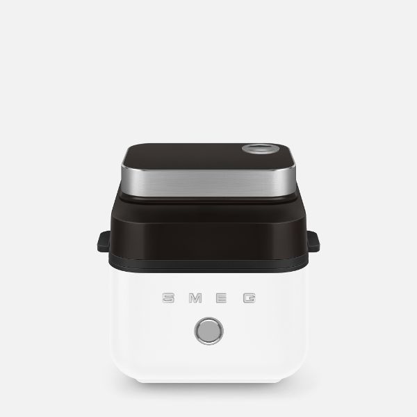 Smeg air fryer featuring sleek black lid and white matte body