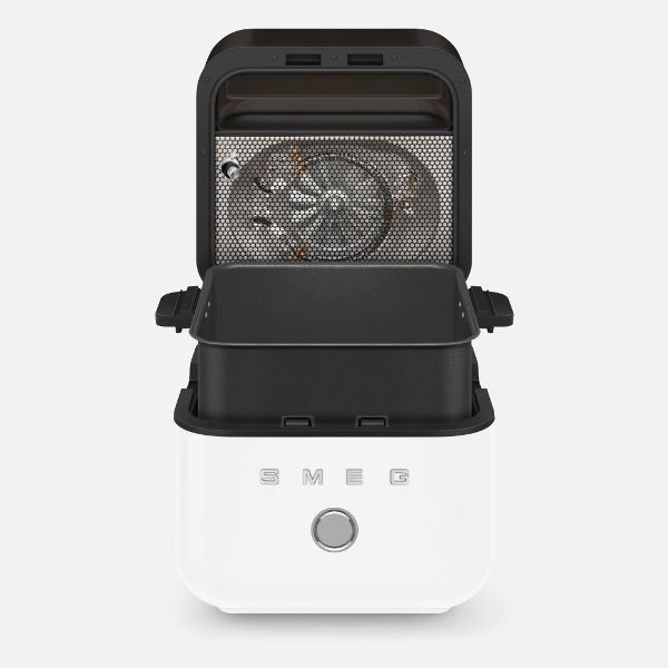 Smeg air fryer featuring sleek black lid and white matte body