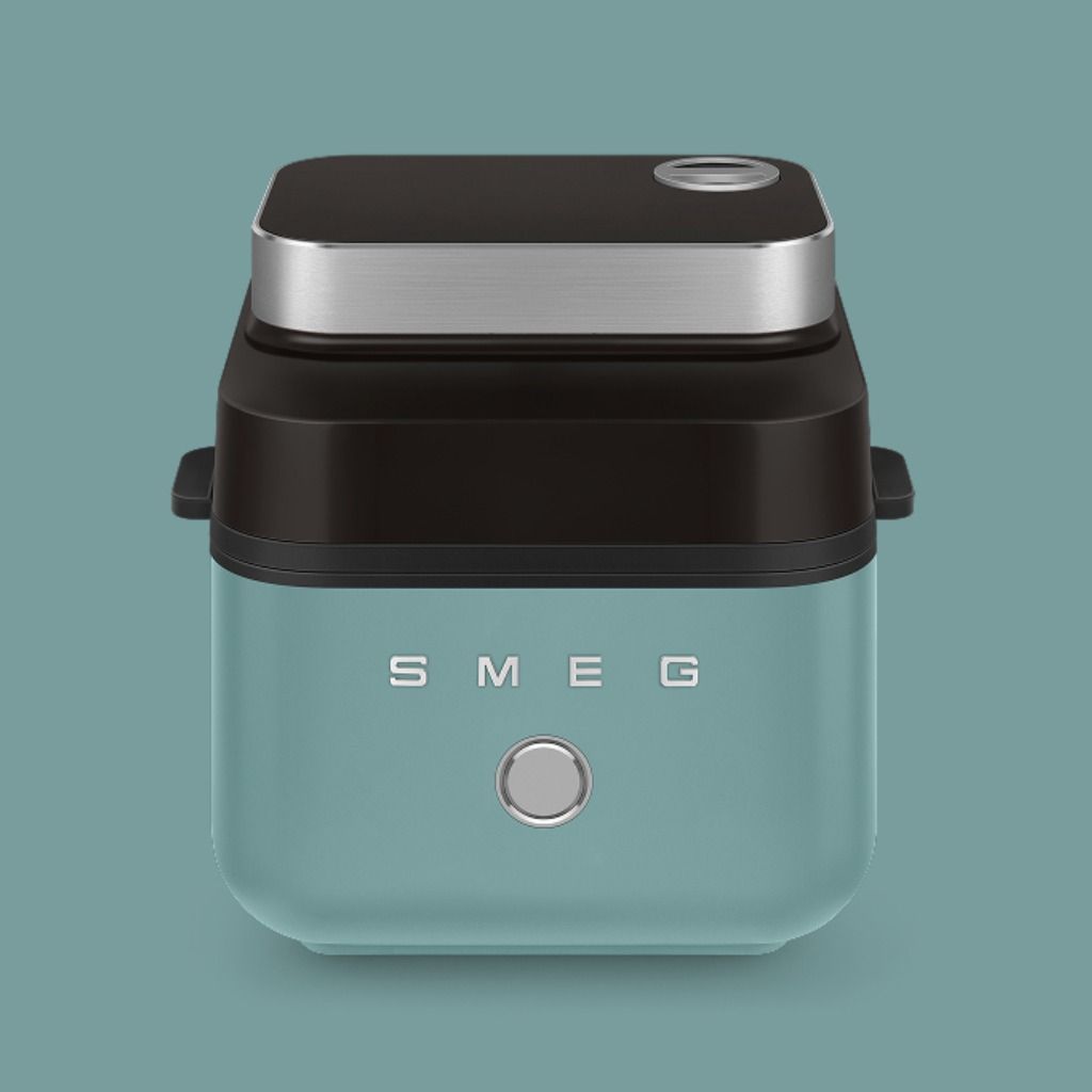 Emerald Green air fryer on a matching background.
