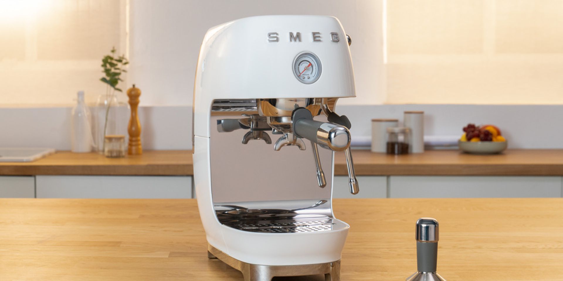 Cream coloured Smeg Cold Brew Espresso coffee Machine with the iconic retro design