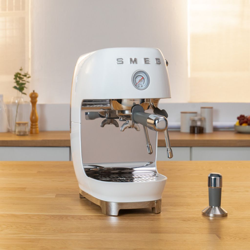 Cream coloured Smeg Cold Brew Espresso coffee Machine with the iconic retro design