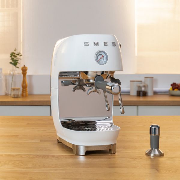 Cream coloured Smeg Cold Brew Espresso coffee Machine with the iconic retro design