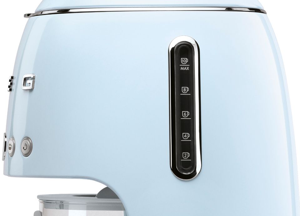 Side view of a pastel blue drip filter coffee machine showing the water level indicator with 2 to 10 cup markings.
