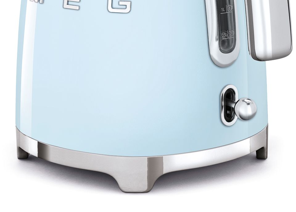 Close-up of a kettle base and chrome power lever.