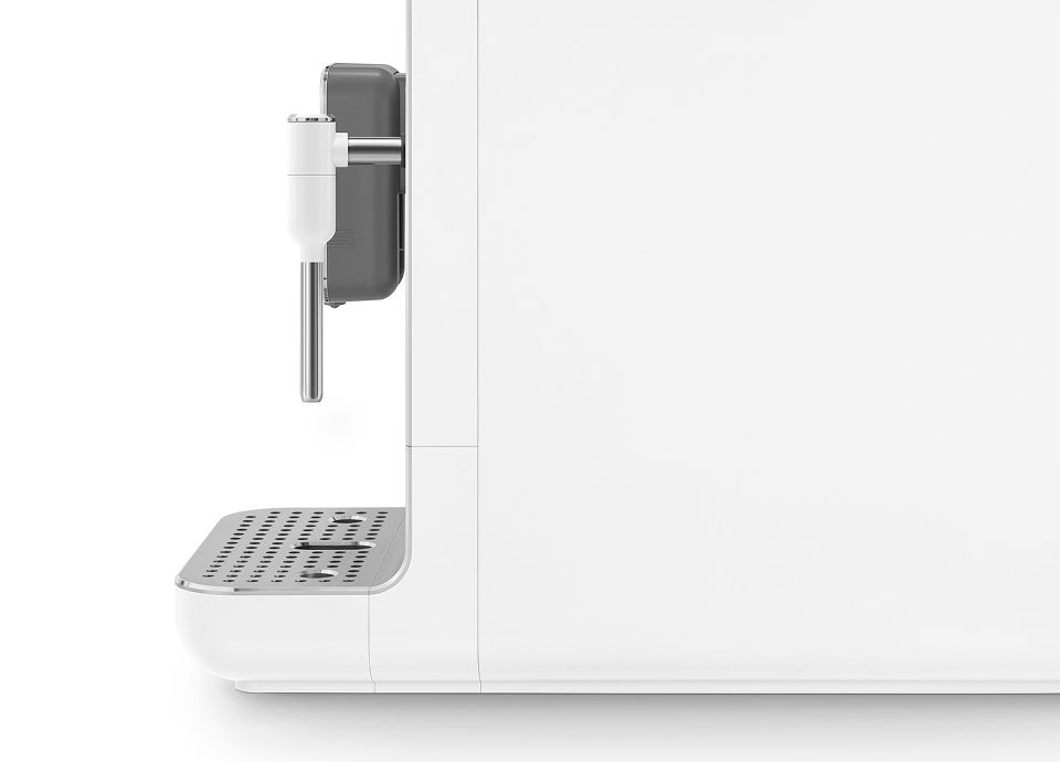 Side view of a white Smeg coffee machine showing steam wand, drip tray, and compact minimalist design