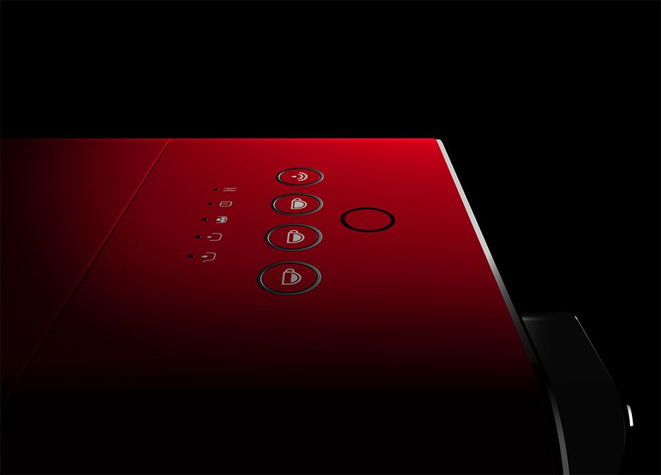 Close-up of the upper section of the BCC12 917 Salzburg Porsche x SMEG Espresso Coffee Machine featuring five control buttons.