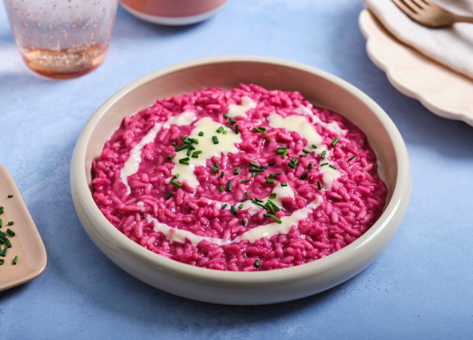 Red beetroot risotto with riesling sauce and chives