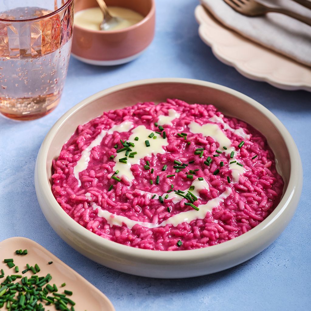 Red beetroot risotto with riesling sauce and chives