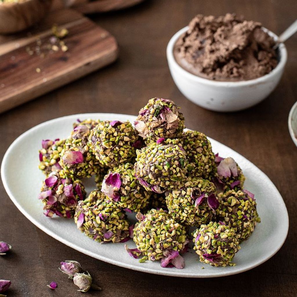 Chocolate and rum truffles with pistachios and roses