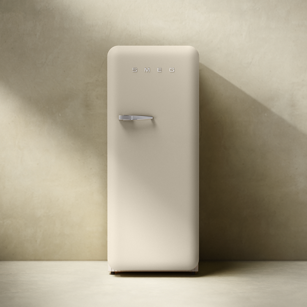 A Smeg 50s style refrigerator in the Moonlight colour, stands against a minimalist neutral wall.