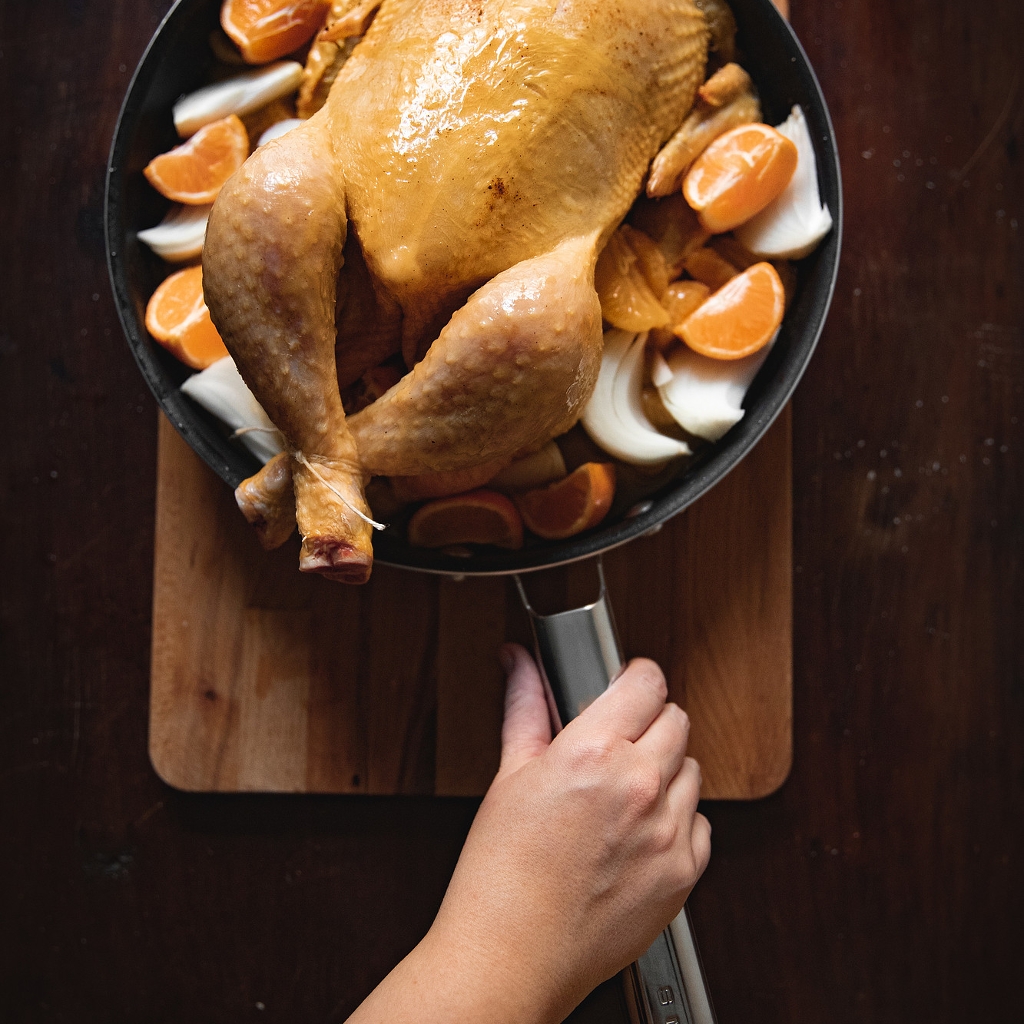 cappone di Natale arrosto con clementine, vaniglia e rum