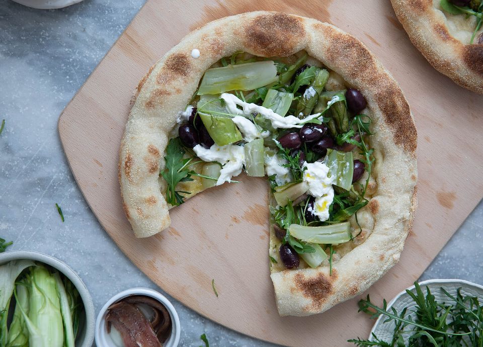 Chicory and anchovies pizza