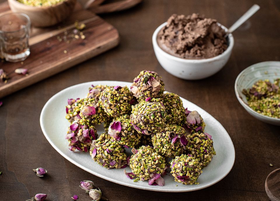 Chocolate and rum truffles, with pistachios and roses