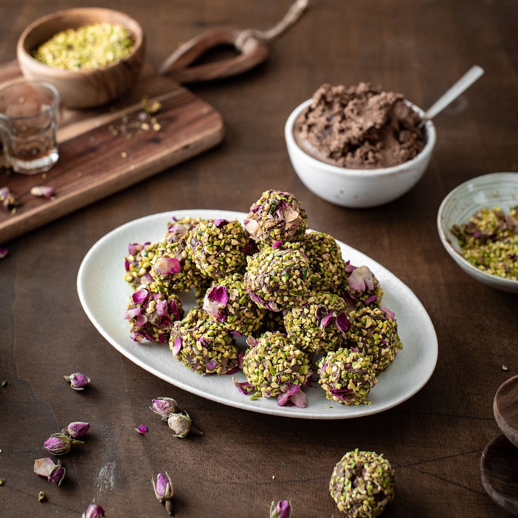 Chocolate and rum truffles, with pistachios and roses